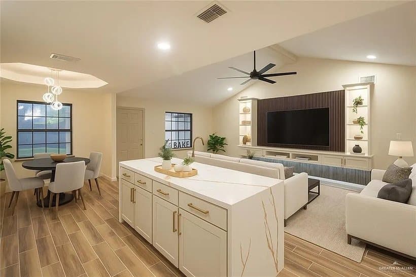 Virtually staged kitchen and living area at 1615 Gloria Ann Drive
