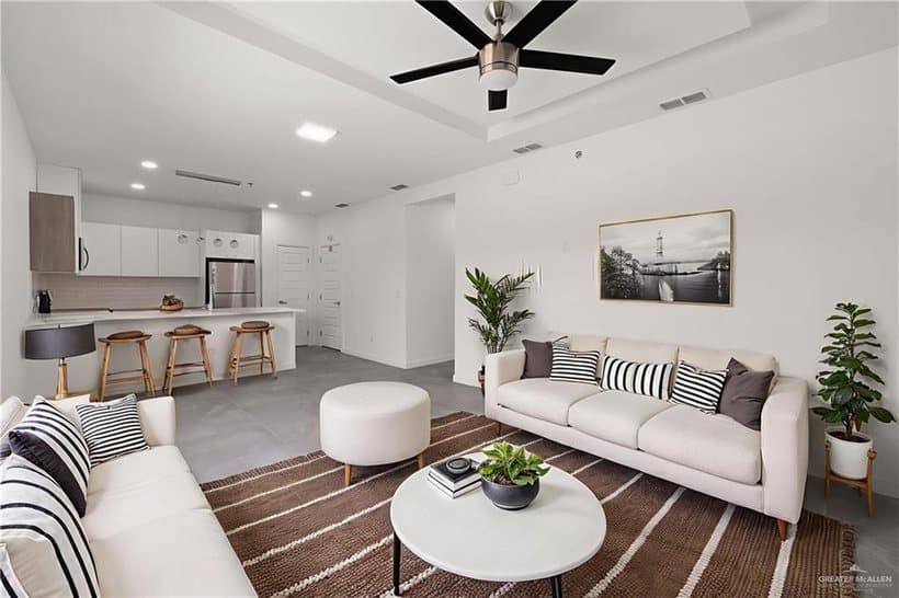 Living room and kitchen in a Pyxies Heights condominium