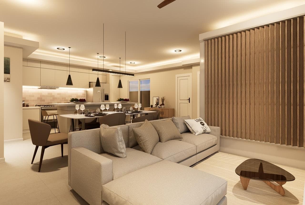 Rendering of the living room with sectional sofa, open to the dining area and kitchen